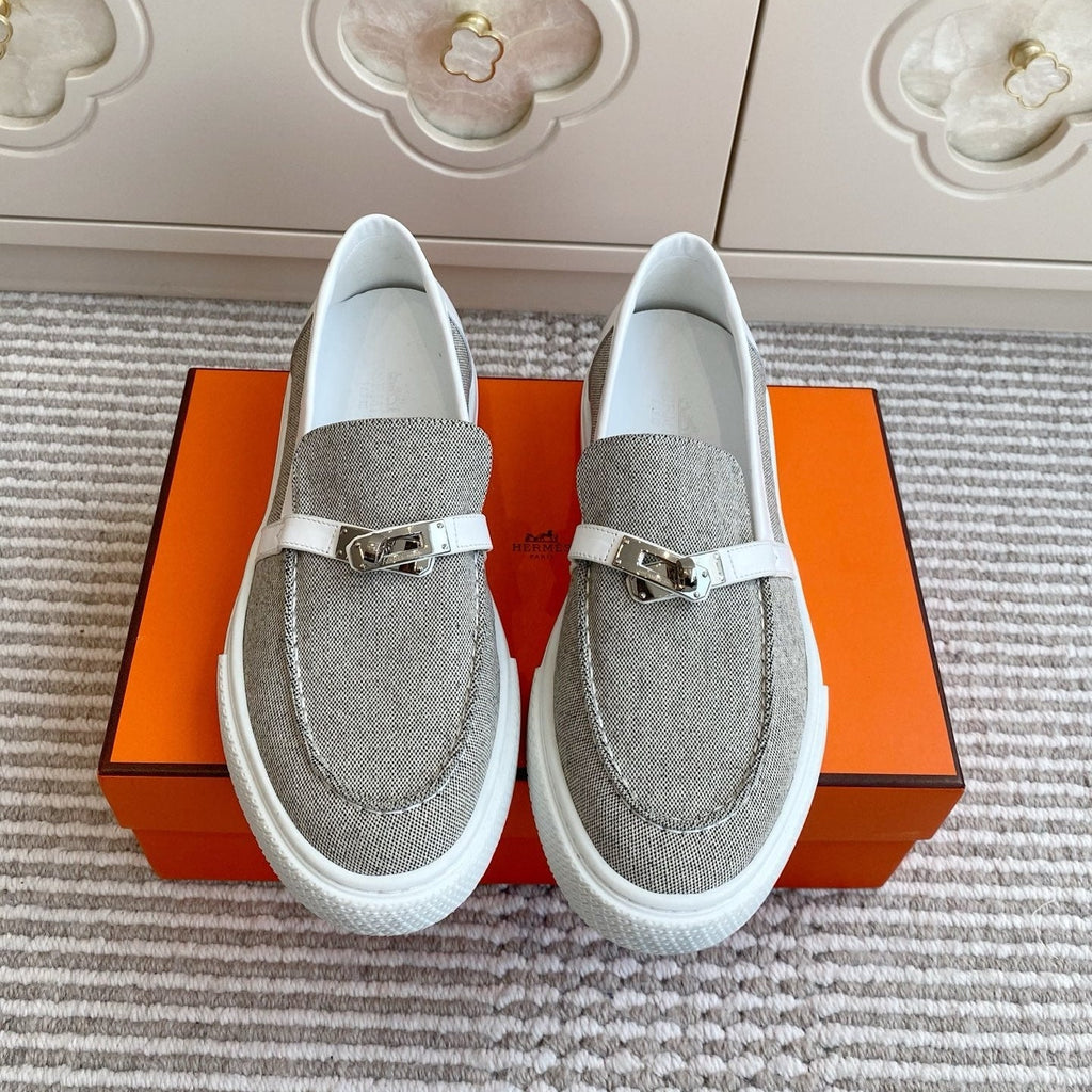 HERMES 25S SLIP-ON IN LIGHT GREY CANVAS WITH SILVER HARDWARE