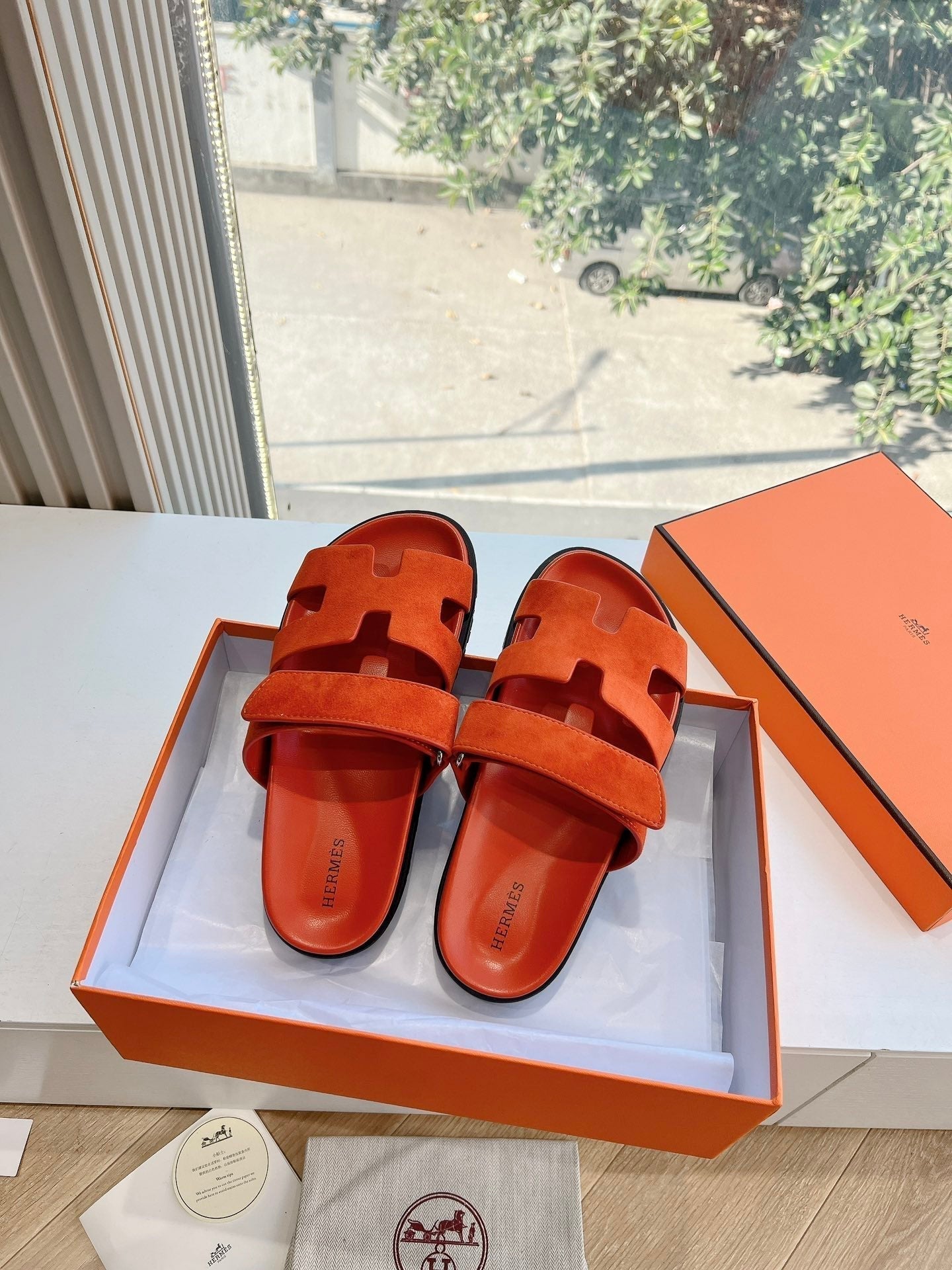 HERMES CHYPRE SANDAL IN FIRE ORANGE SUEDE